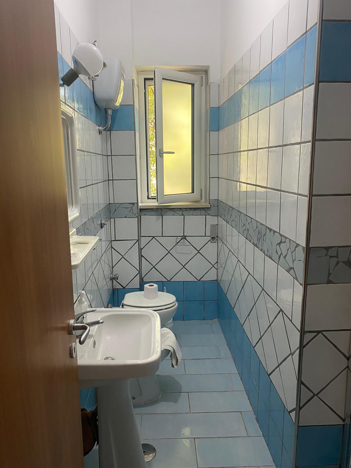 Bilocali con patio - bagno