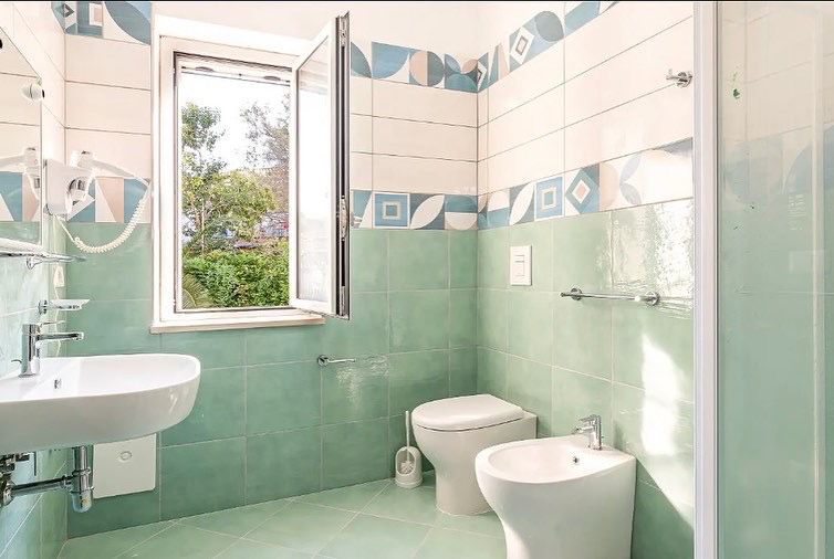Bilocali con patio - bagno
